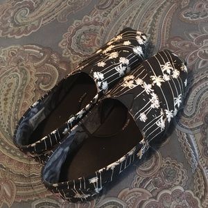 Bobs black and white palm tree slip ons